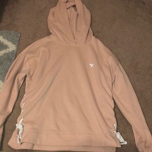cream/salmon victoria’s secret pink lace up hoodie